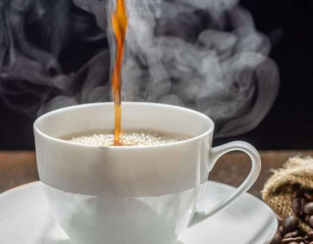 cropped-the-steam-from-pouring-coffee-into-cup-a-cup-of-fresh-coffee-1.jpg
